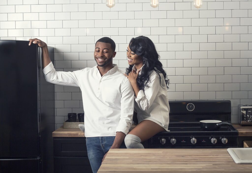 couple, smiling, kitchen